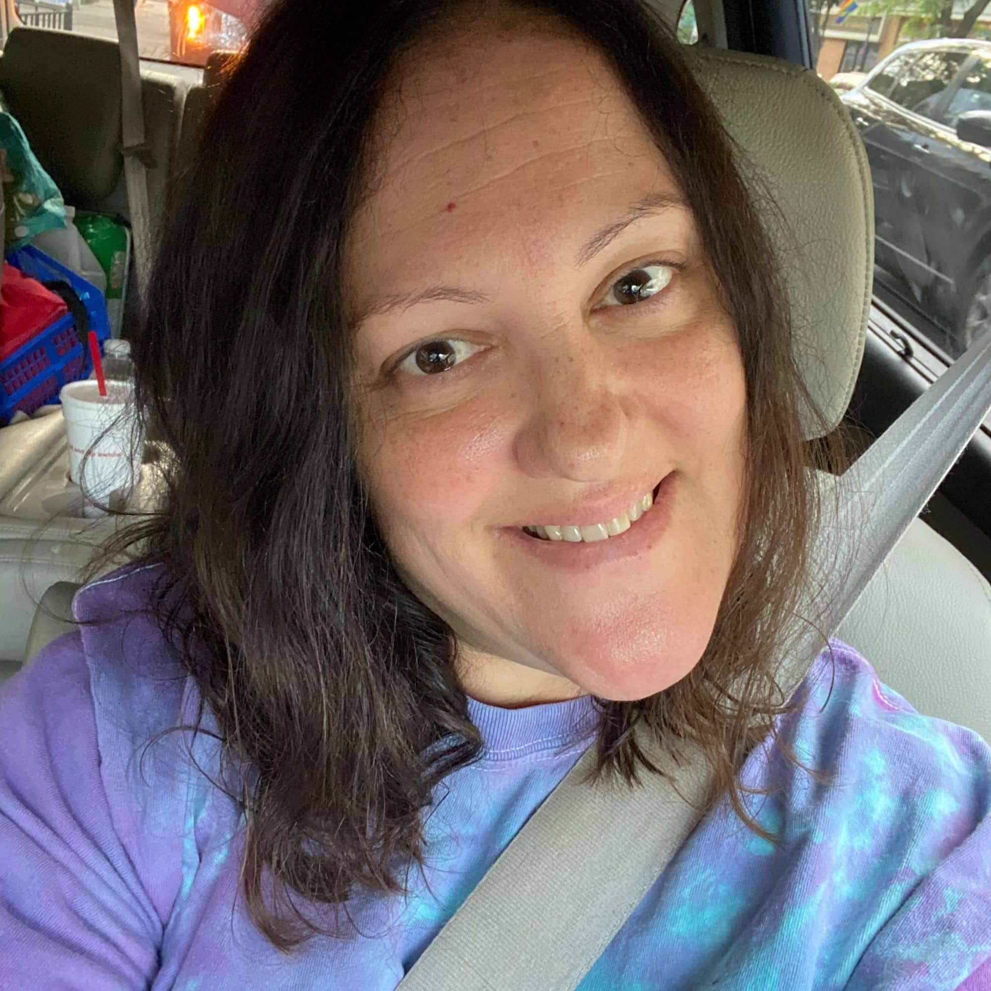 female smiling in facebook headshot