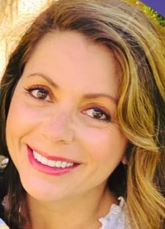 woman smiling in facebook headshot